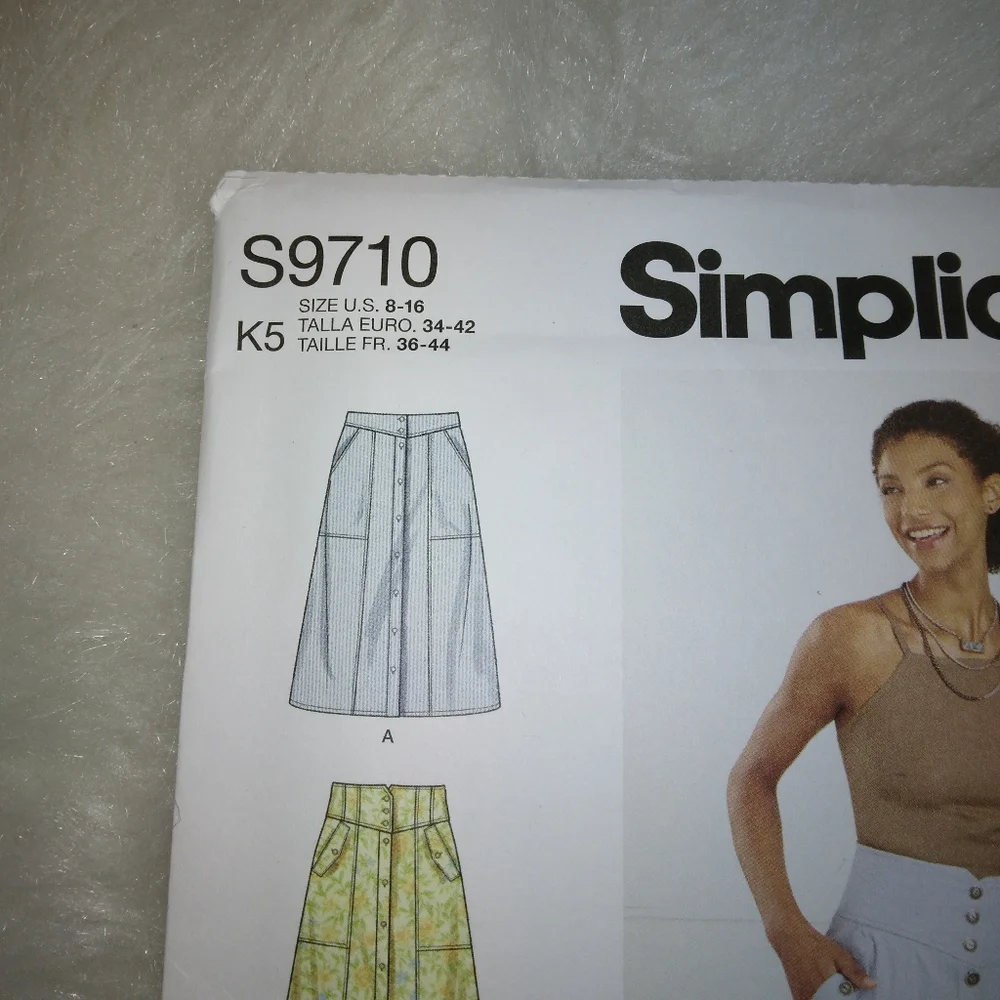 Simplicity S9710 Sz 8-16 Misses Button front skirts with pockets, 3 variations